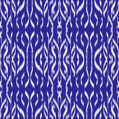 Ikat Shibori Indigo Blue and White Abstract Geometric Seamless Fabric Pattern for Textile Background Wallpaper