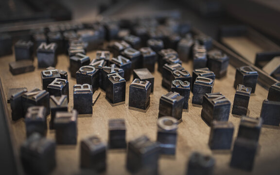 Close up on the metal type pieces for the printing press