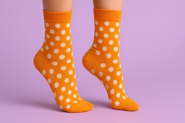 Bright orange polka dot socks fashion event studio product photography trendy atmosphere close-up view
