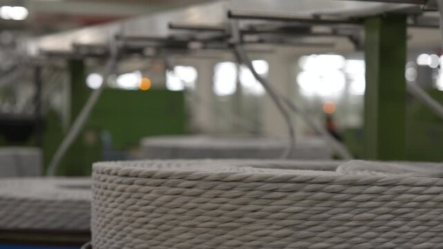 Close-Up of Twisted Yarn Wound on Spool in Textile Factory