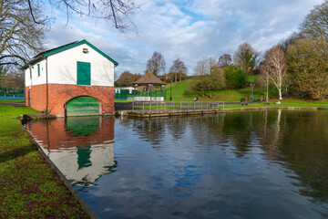 Warminster pleasure grounds, with the former boathouse now a public toilet. Tennis courts and bandstand.