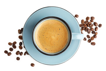 Aromatic coffee in cup and beans on white background, top view