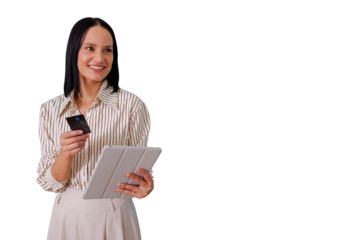 Woman holding credit card and tablet, smiling, enjoying online shopping and e-commerce payment technology