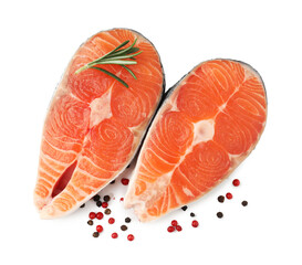 Pieces of salmon fillet with spices isolated on white, top view