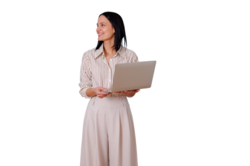 Businesswoman standing, smiling and holding a laptop, engaging with digital work, transparent background