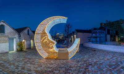 Paris - France,France - 12 16 2025: Paris By Christmas Night. View Saint-Emilion courtyard at Bercy Village decorating for christmas at blue hour © Franck Legros