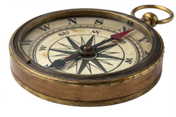 Antique brass compass, a vintage navigational tool with a red indicator needle pointing north, isolated on a white background, symbolizing direction and exploration