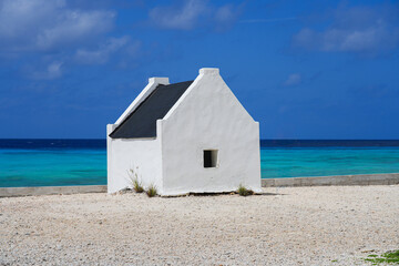 Historic white Slave Hut (Slave House) on the Salt Flats Coast of Bonaire in the Dutch Caribbean