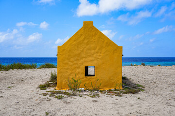 Historic red Slave Hut (Slave House) on the Salt Flats Coast of Bonaire in the Dutch Caribbean