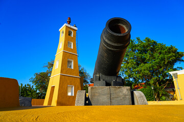 Old cannon on the ramparts of Fort Oranje and Lighthouse in Kralendijk, Bonaire - 17th century...