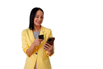 Woman making online payment on smartphone with credit card, smiling for successful e-commerce shopping