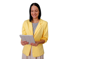 Fototapeta premium Businesswoman smiling, holding a tablet, browsing digital content. Young professional using modern technology. Transparent background