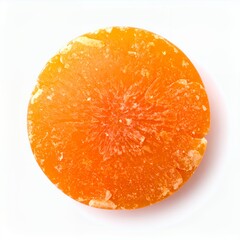 Vibrant orange confectionery disc on a seamless white background offers visual allure