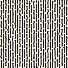 Vector seamless organic pattern. Black wavy vertical lines on a white background create an abstract pattern. The lines vary slightly in thickness and distance, conveying a dynamic, rhythmic feel.