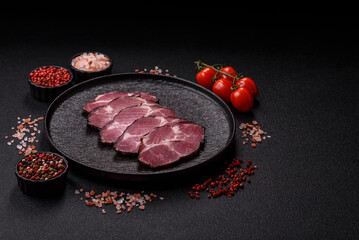 Meat, smoked ham, or pork sausage sliced for breakfast sandwiches. Sliced ham