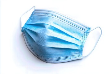 Blue medical face mask isolated on white background.