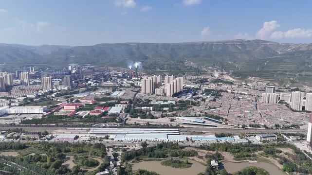 Xining City Aerial Skyline Shot with Mountains and Urban Development