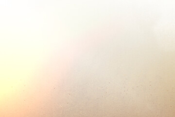 Textured surface with subtle variations in color and pattern observed in a natural setting during daylight