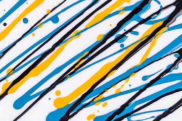 Abstract acrylic paint with vibrant streaks on white