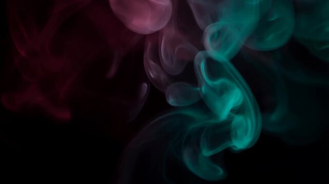 Abstract duotone smoke wisps in magenta and teal swirling on black background, fluid curling motion
