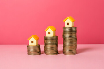 Rising coins house trend growth real estate finance concept property investment savings mortgage interest rate increase housing market demand wealth planning optimism