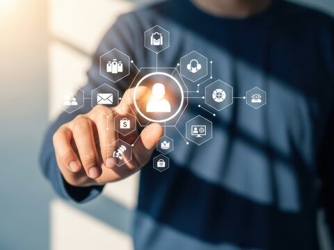 A person interacting with digital icons on a touchscreen interface with various symbols - Powered by Adobe