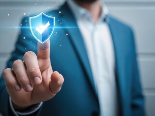 Businessman interacting with a digital shield icon on his finger tip in a modern office environment with blurred background