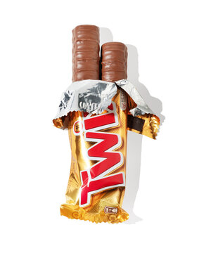 Chocolate Twix in an open package. isolated on white background with clipping path