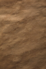 Old and distressed aged crumpled paper sheet with stains texture