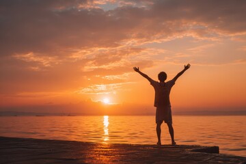 Fototapeta premium Joyful Young Man Embracing Freedom at Sunrise on Beach, Celebrating Life and Adventure