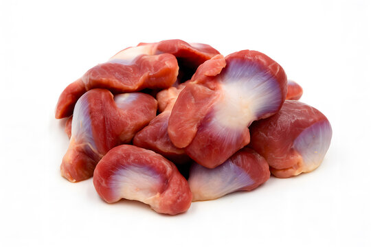 Raw chicken gizzards piled together representing poultry ingredients butcher shop products protein food preparation and culinary processing