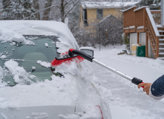 removing snow on the car