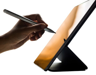 Hand Holding Stylus Pen Above Digital Tablet Isolated for Creative Design, Drawing, and Digital Illustration Concept