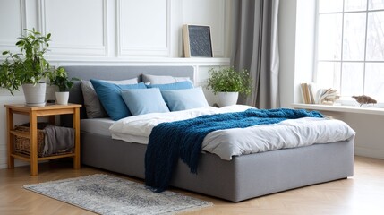 Fototapeta premium Modern bedroom design featuring natural light and minimalist decor in a spacious setting
