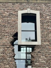 Replacement windows in a brick wall