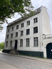 White brick tall building