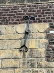 Iron anchor plates on a brick wall