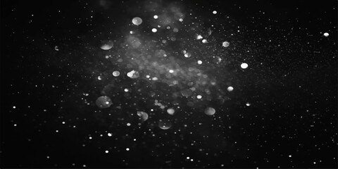 Abstract falling snowflakes and shimmering particles drift in slow motion against a dark blue winter night sky filled with glowing stars and cosmic galaxy dust
