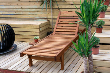 Wooden Sun Lounger on Outdoor Patio Deck