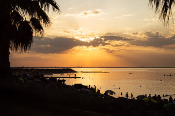 Mar Chiquita lagoon at orange sunset, summer