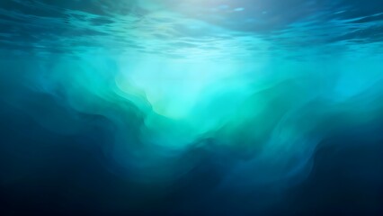 Underwater blue water surface with sun rays and light reflections. Deep sea view with turquoise and dark blue hues, aquatic natural background texture.
