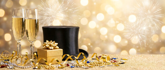 New Year Celebration with Champagne and shiny decoration. Elegant celebration scene with champagne, a golden masquerade mask, gift, and a countdown clock.