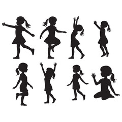Obraz premium A collection of playful silhouettes depicting young girls engaged in various joyful and energetic activities like dancing