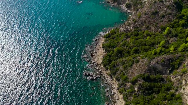 Aerial Panorama Drone View of the Ionian coastline with rugged cliffs rolling hills and secluded coves on Zakynthos Island Greece