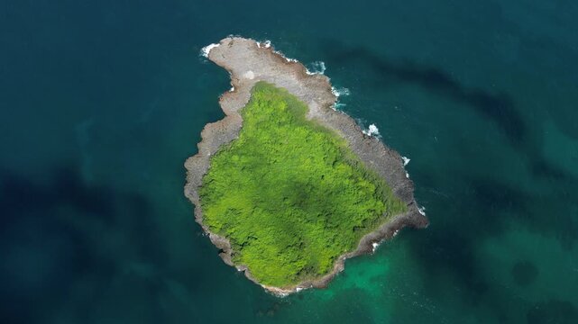 Drone view connecting Limon Island with Moron Beach in the distance, highlighting coastal geography