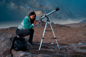 Woman focusing telescope on stars in dark night landscape, exploring astronomy