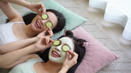 Young Women Applying Homemade Beauty Masks at Home &mdash; Natural Skincare & Friendship Lifestyle Portrait