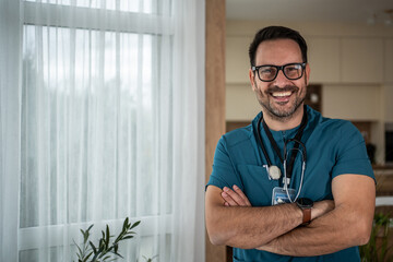 Male doctor professional smiling confidently at camera
