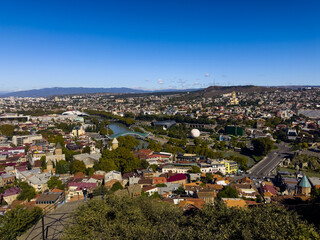 Fototapeta premium Panoramic View of Tbilisi City Center with Bridge of Peace Georgia