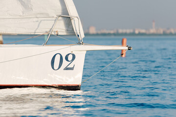 bow of a sailing boat with bowsprit at sailing regatta in the Gulf of Finland at sunny day, sailing...
